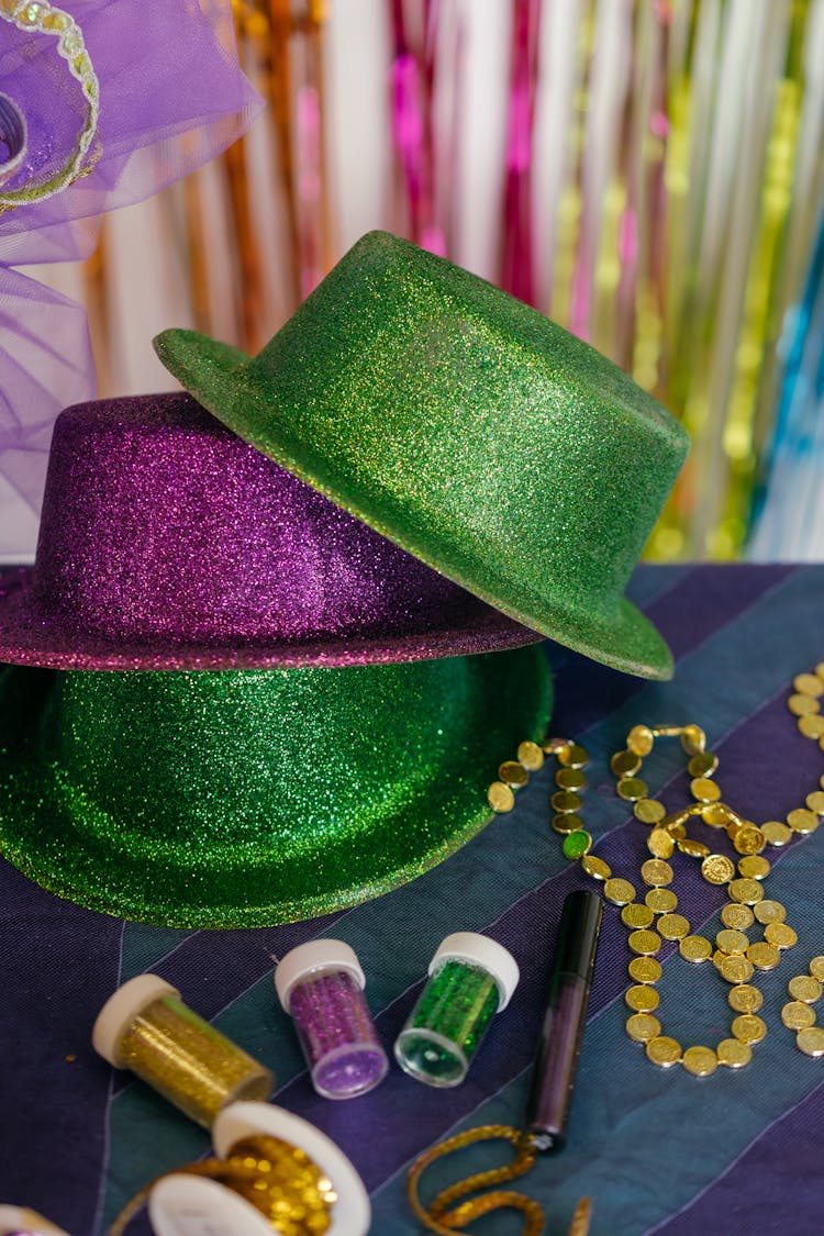 Glittery Green And Purple Hats In Close-up Shot