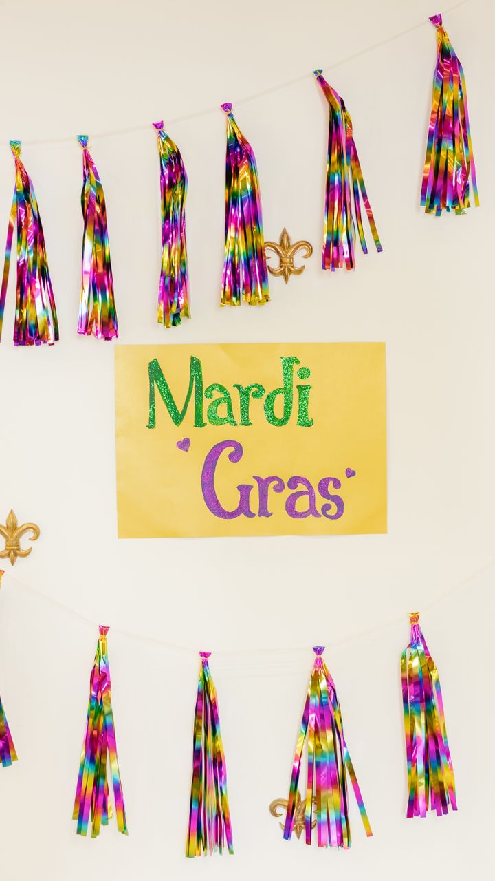 Neutral cotton fringe tassel garland draped behind a boho coffee bar counter for decoration