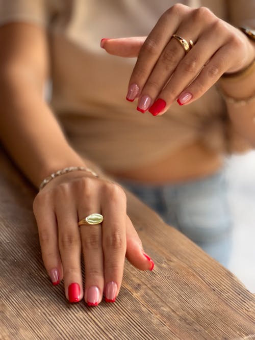 Woman Wearing Gold Rings