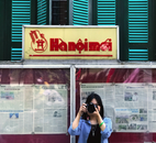 A Woman Taking a Picture