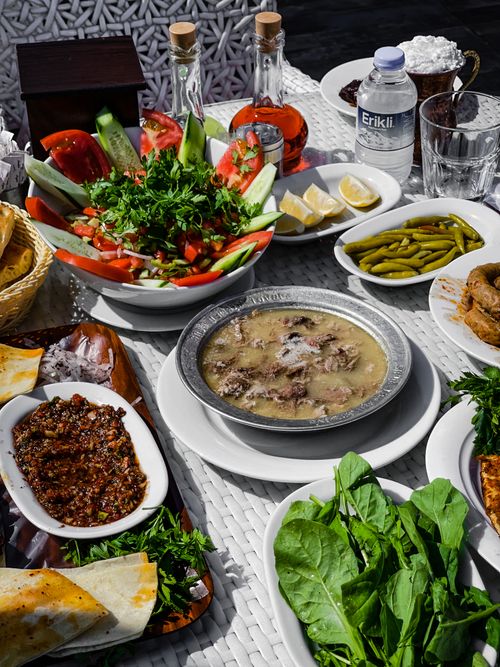 Free An inviting table of Turkish cuisine featuring a variety of dishes, salads, and beverages. Stock Photo