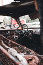 Black Steering Wheel of a Broken Vehicle