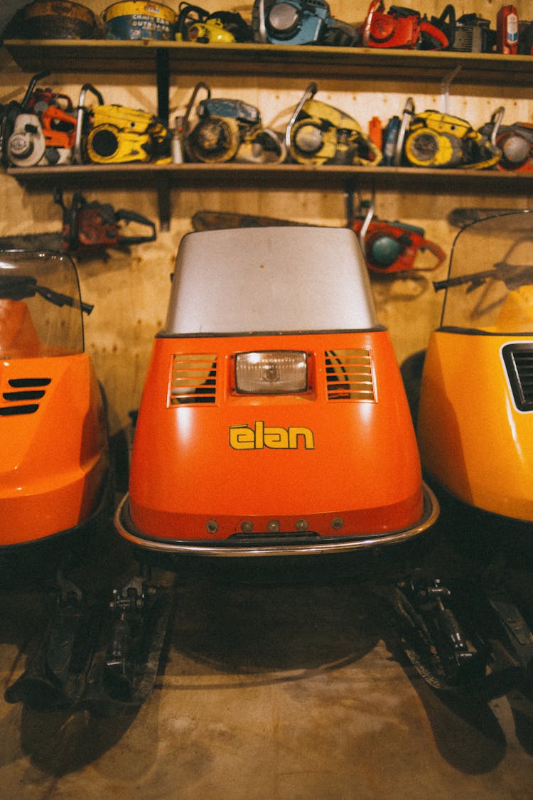 Snow Vehicles Parked In Garage