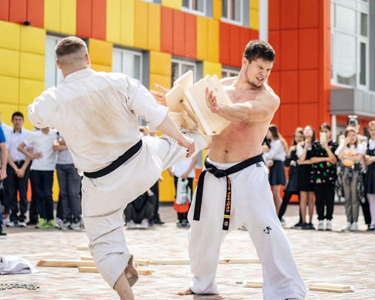 Man Breaking Wooden Plank With Kick