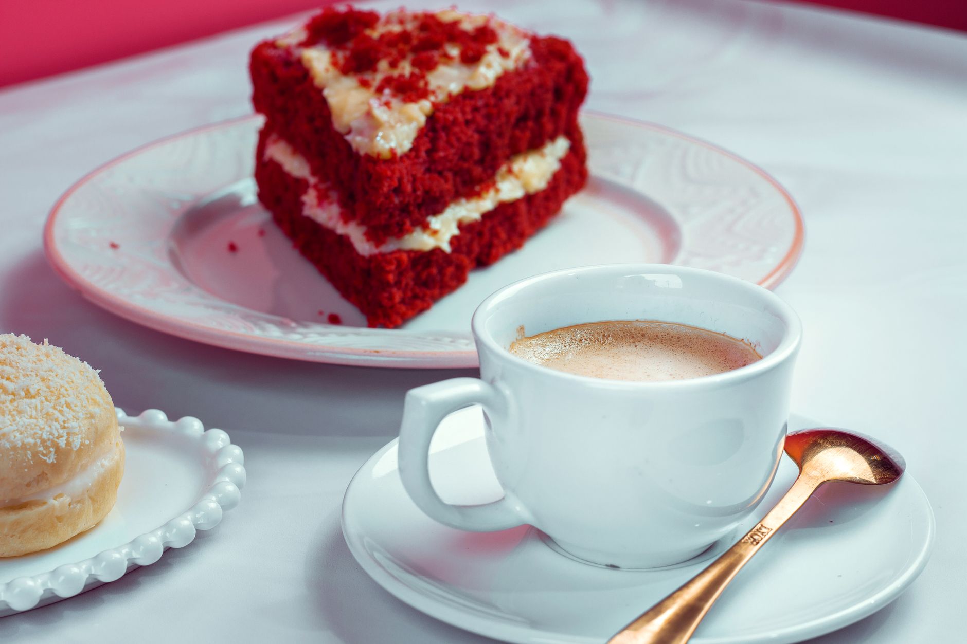 Coconut Sheet Cake with Marshmallow-Cream Cheese Frosting on a plate