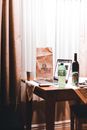Drinks and a Laptop on a Wooden Table