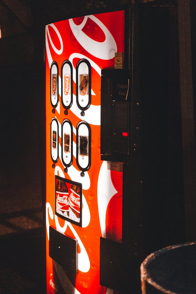 Red Soda Machine At Night