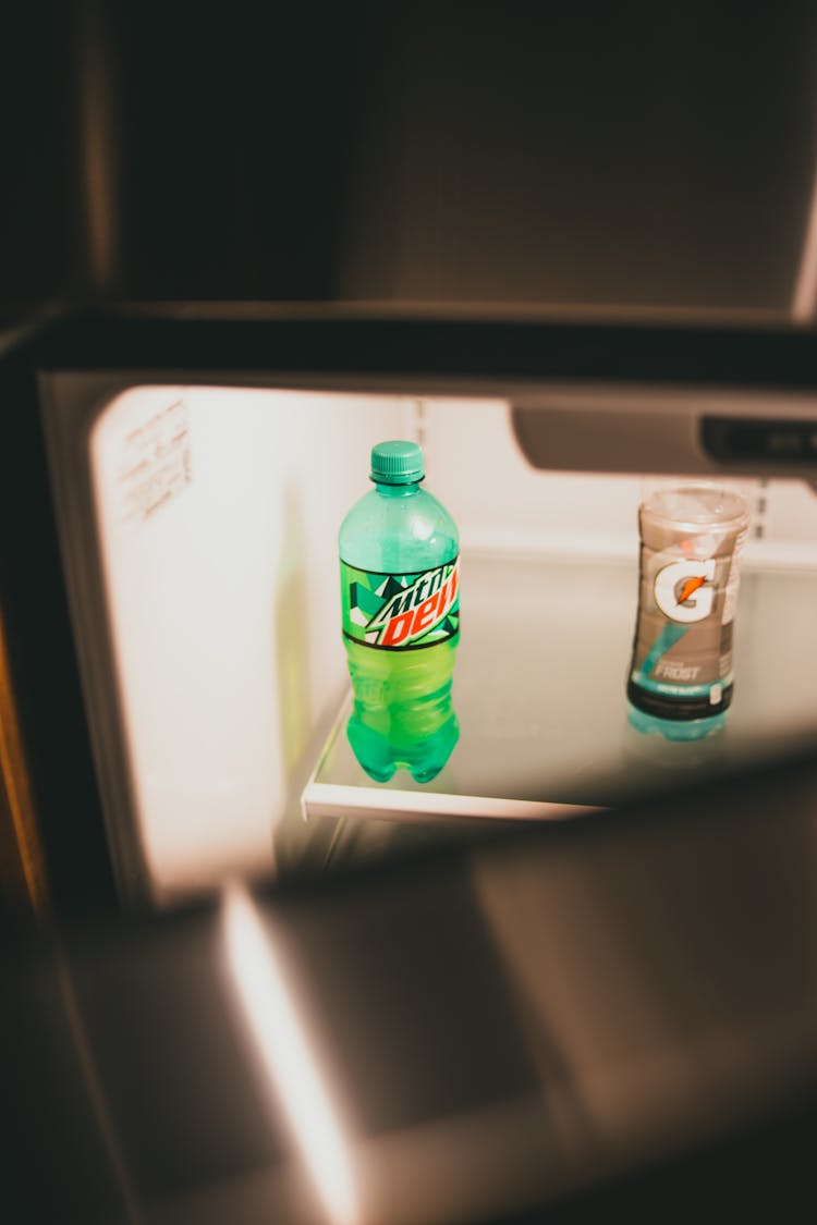 Bottles Of Soda In Empty Fridge