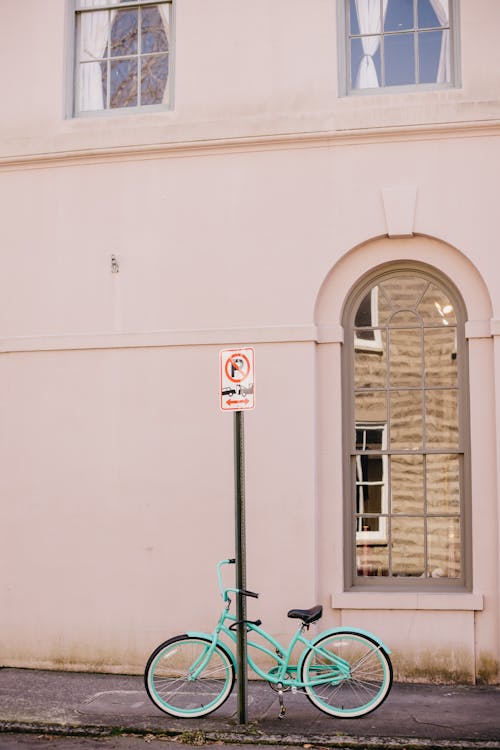 White and Red No Smoking Sign on White Concrete Building