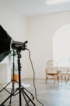 Modern studio setup with professional lighting equipment and minimalistic design. - Fotografer Sidoarjo
