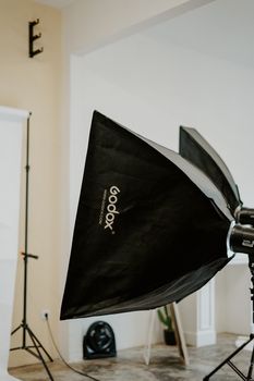 High-quality lighting setup in a professional photography studio with Godox softboxes. - Fotografer Sidoarjo