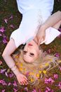 Woman in White Sleeveless Dress Lying on Purple Flower Field