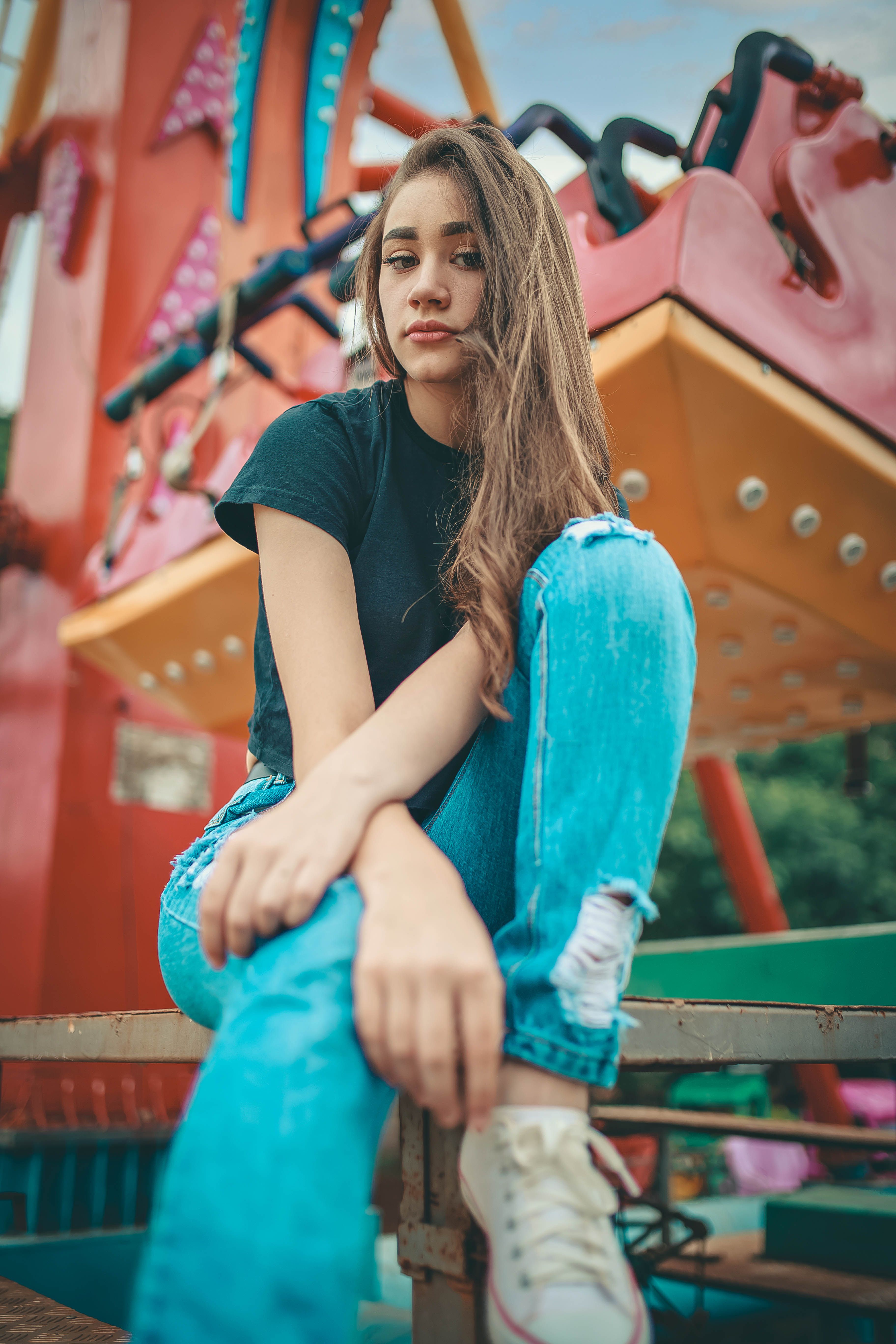 Photo Of Woman Sitting On Ground · Free Stock Photo
