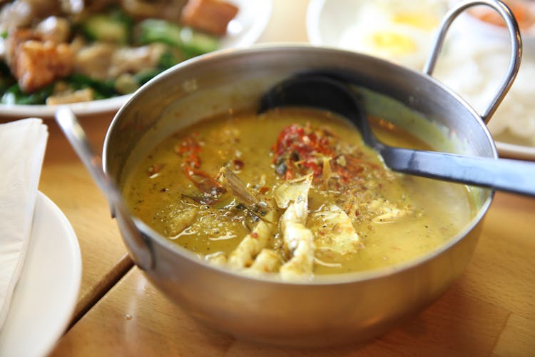 Rich Broth With Chicken In Bowl