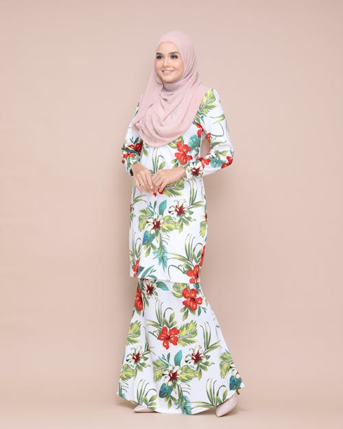 Woman in Floral Traditional Dress with Hijab