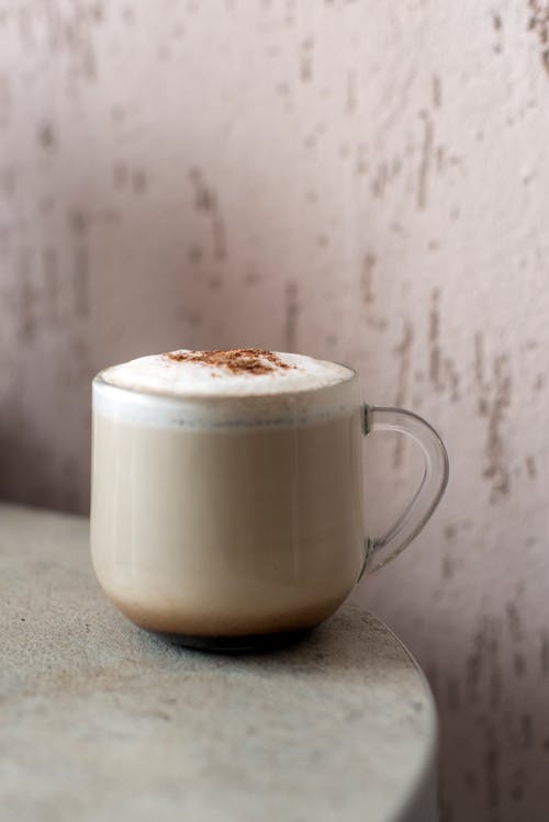 A Cup of Cappucino in a Clear Cup