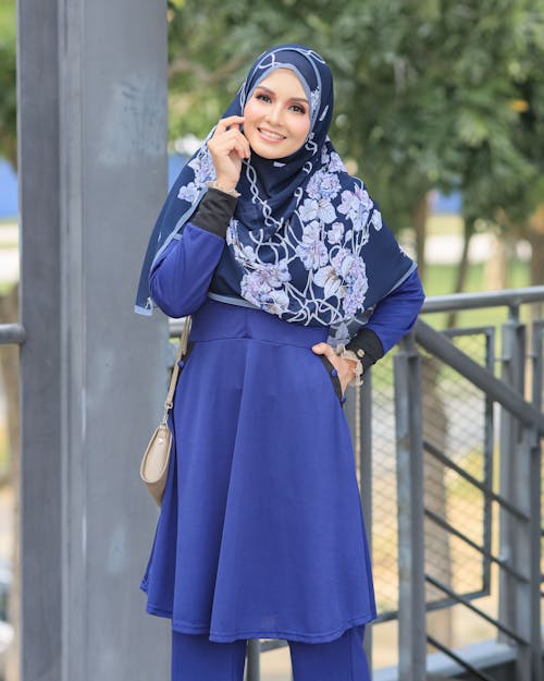 Smiling Woman in Hijab Posing Outdoors
