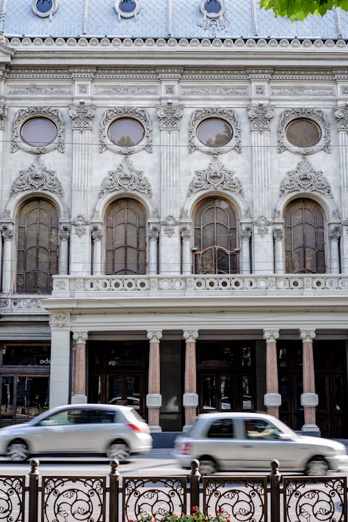 Cars Passing in Front of the Rustaveli Theater in Tbilisi Georgia