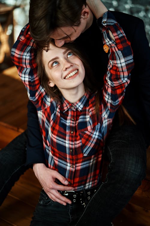 Free A Young Couple Holding Each Other Stock Photo