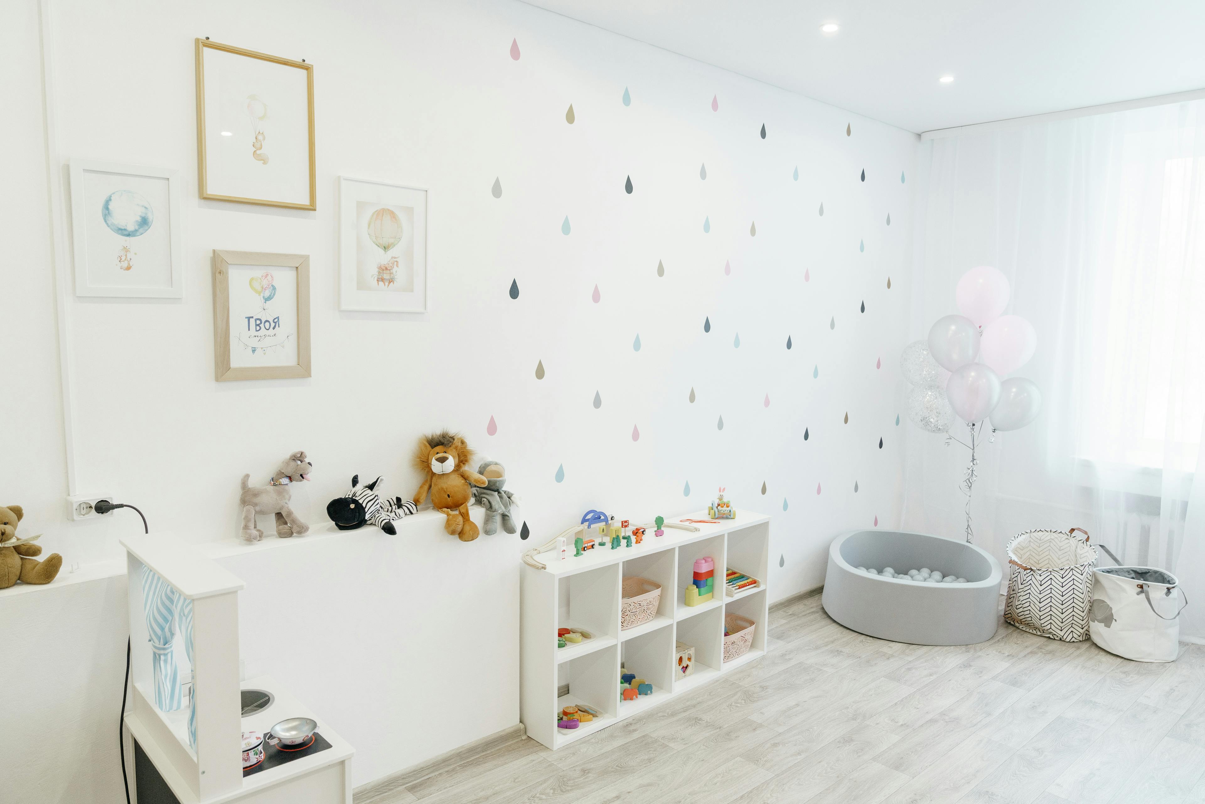 Free A Contemporary White Themed Nursery Room Stock Photo