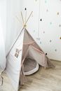 White and Blue Tent on Brown Wooden Floor