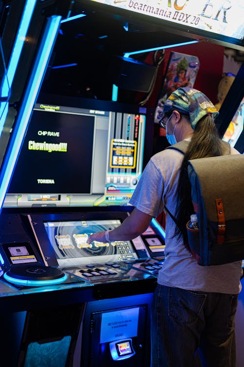 A Man Playing Arcade