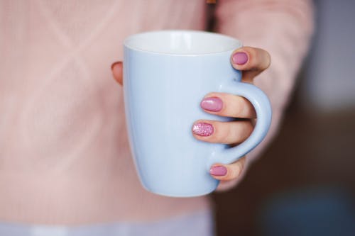 Free Person Holding White Ceramic Mug Stock Photo