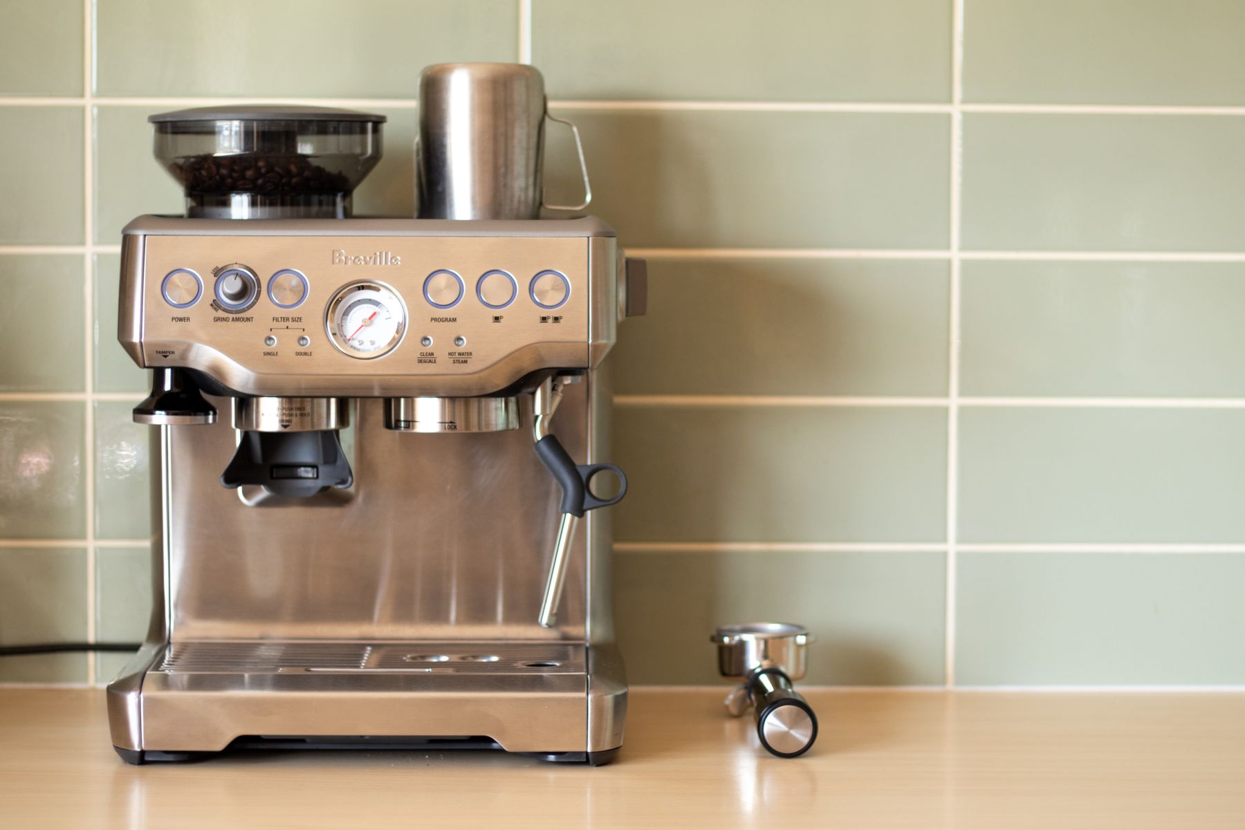 Compact entry-level espresso machine on a kitchen counter