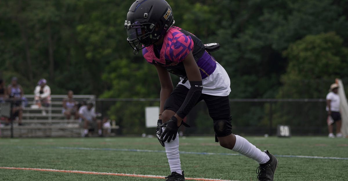 Youth football player in action on the field in Columbia, MD.
