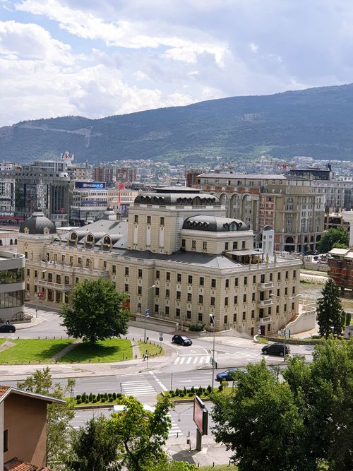 Free A scenic aerial view of Skopje's urban architecture with mountains in the background. Perfect for travel and cityscape themes. Stock Photo