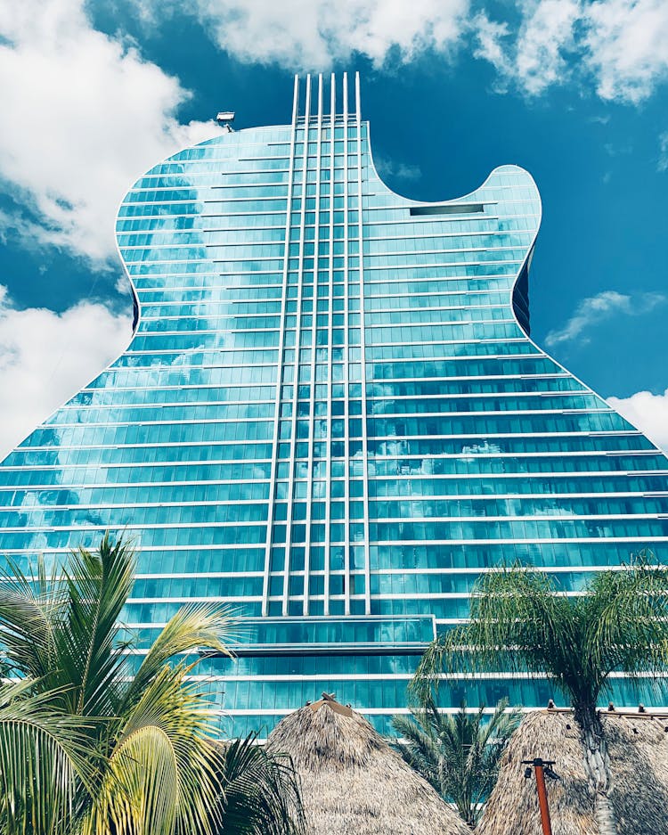 The Seminole Hard Rock Guitar Shaped Hotel And Casino Under Blue Sky