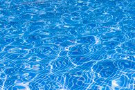 Blue Water With Water Reflection