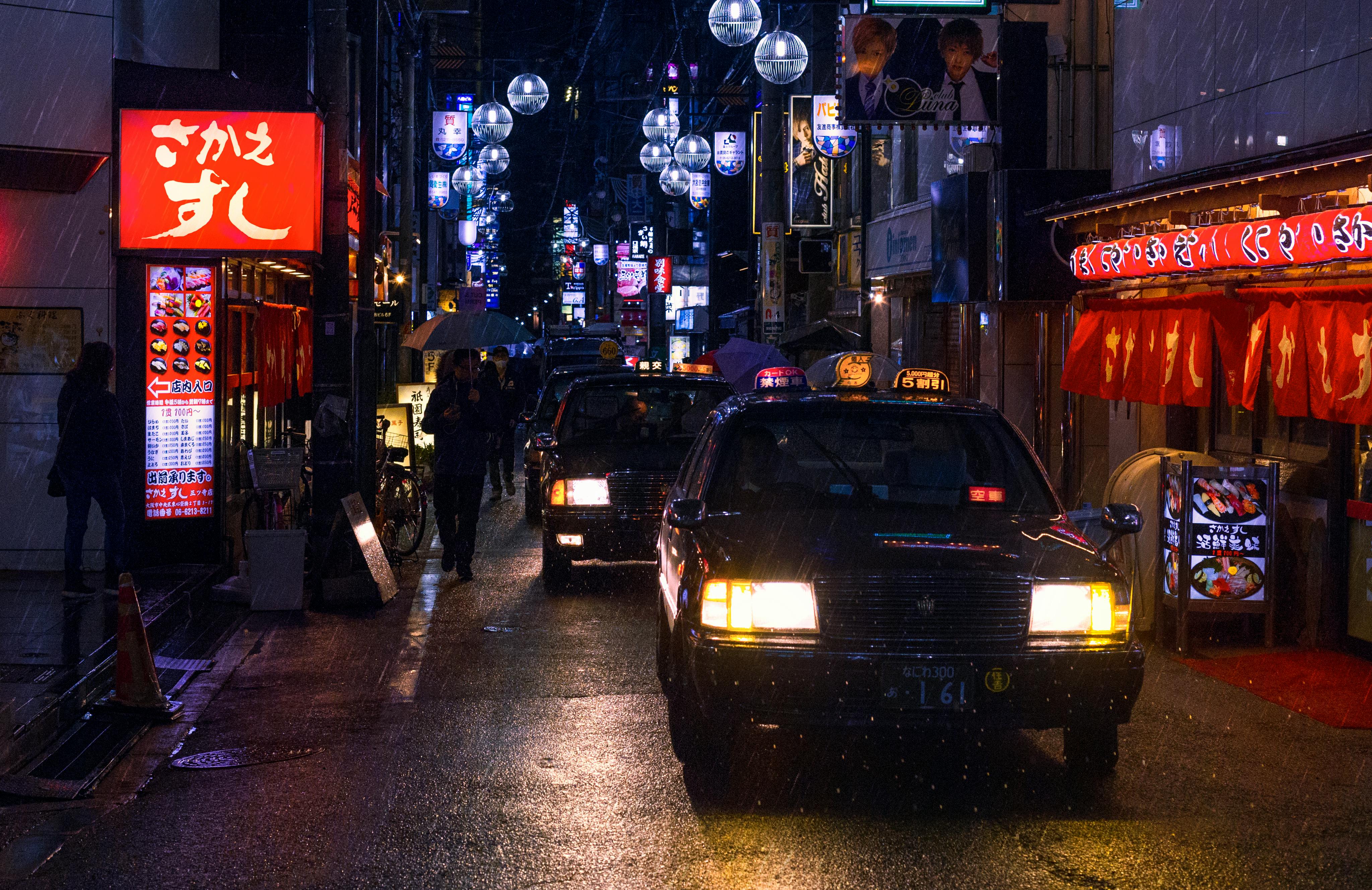 photo of cars in the street