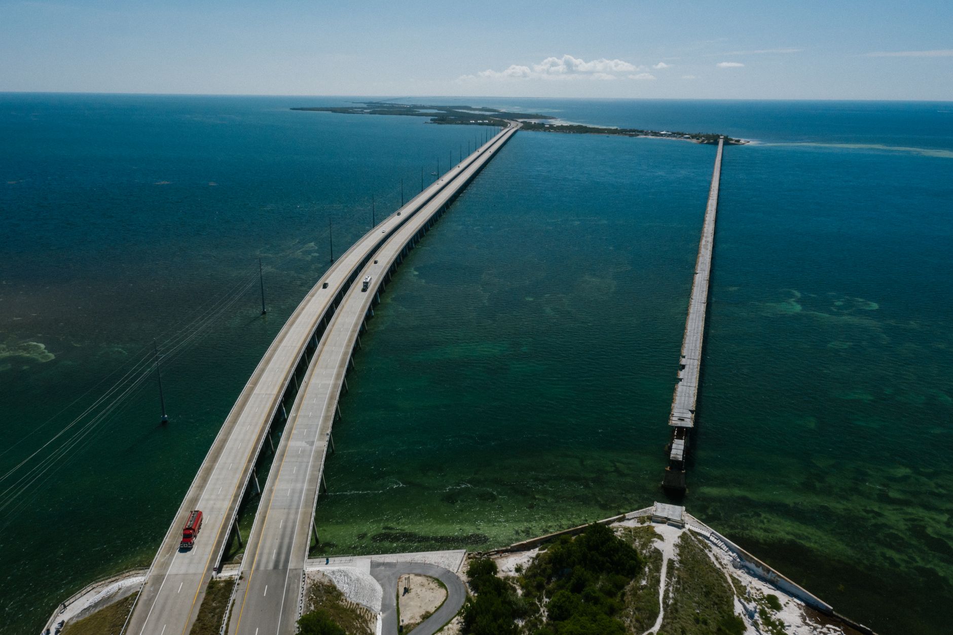 Aerial view of the iconic Seven Mile Bridge stretching over the clear blue waters of the Florida Keys.