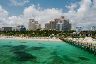 Stunning beachfront resort with turquoise waters and tropical ambiance.