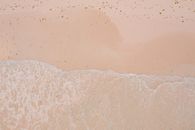 Ocean Waves on Brown Sand