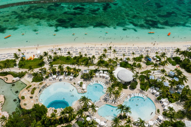 Birds Eye View Of Swimming Pools At A Beachfront Resort