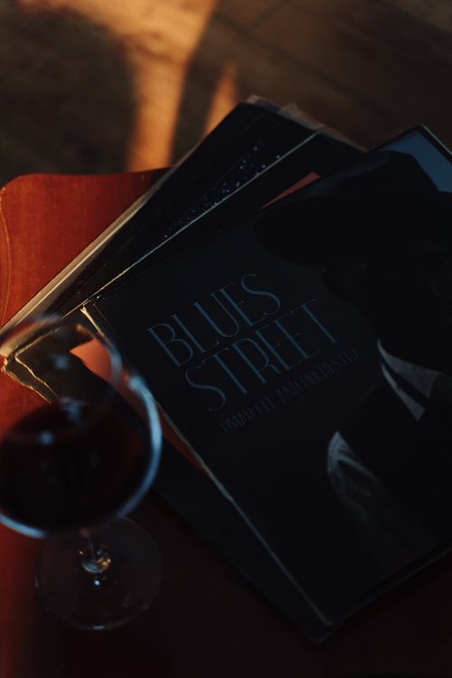 Free Vinyl Records and a Glass of Wine Stock Photo