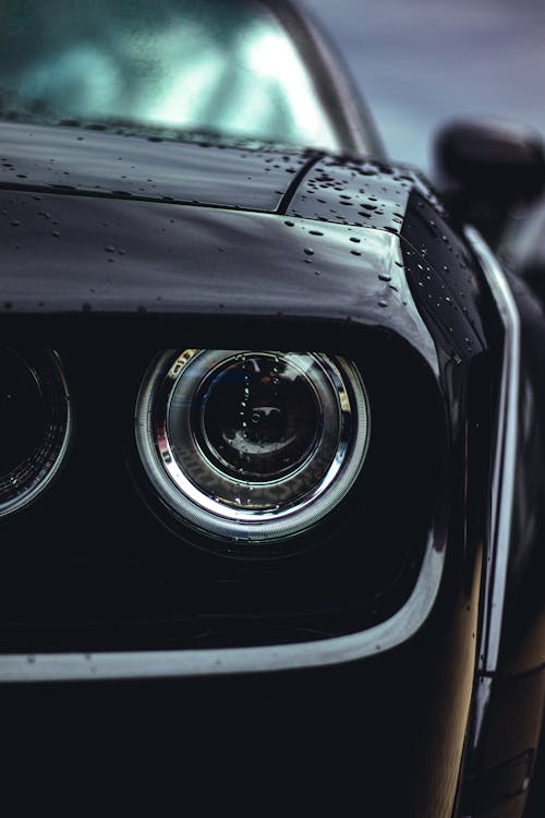 Black and Silver Headlight of a Car