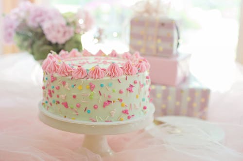 Free Pink and White Cake on Cake Stand Stock Photo