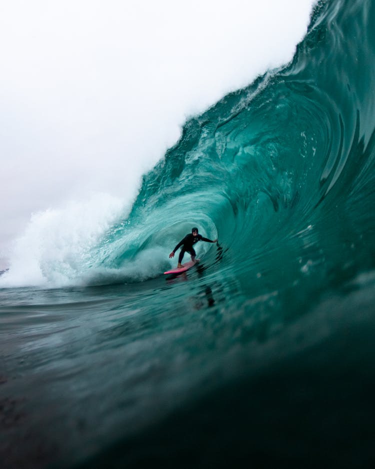 Person Surfing In The Wave