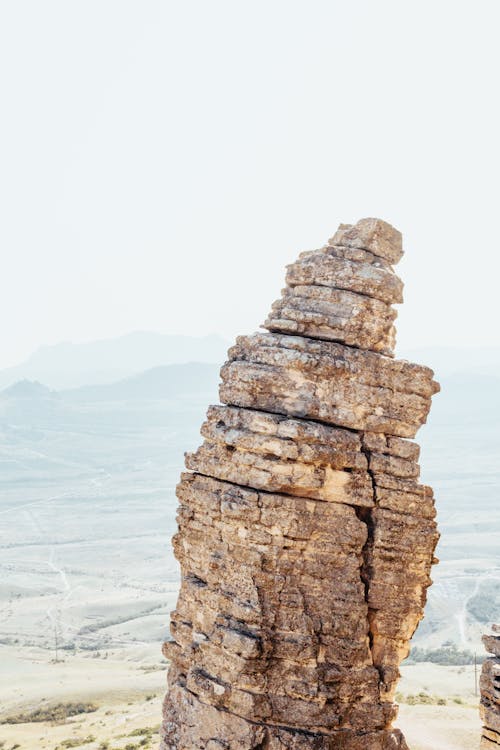 Brown Rock Formation under White Sky