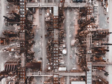 Aerial view showcasing a sprawling industrial factory complex with detailed metal structures.
