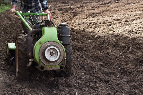 Close up of Walking Tractor on Field