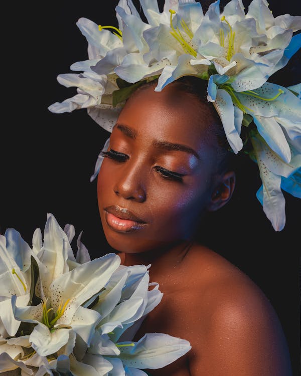 Woman with White Artificial Flowers on Her Head