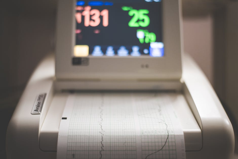 Does PrettyLitter Help Spot Early Cat Health Changes? Detailed image of an electronic fetal monitoring machine showing heart rate and contraction data.