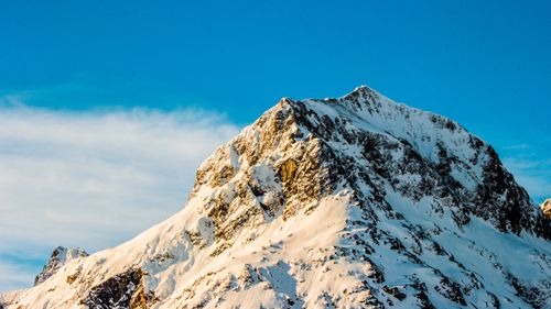 Free Stunning snow-covered mountain peak with clear blue sky in Lech, Austria. Stock Photo