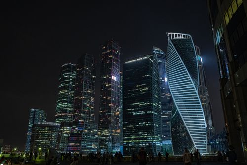 Free Majestic night skyline of Moscow with illuminated skyscrapers and vibrant urban atmosphere. Stock Photo