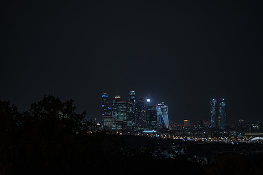 Stunning cityscape featuring illuminated skyscrapers against the night sky.