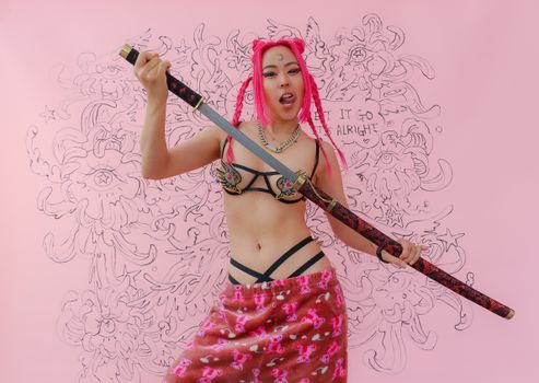 Creative cosplay portrait featuring a woman with pink hair, posing with a katana against a detailed pink backdrop.